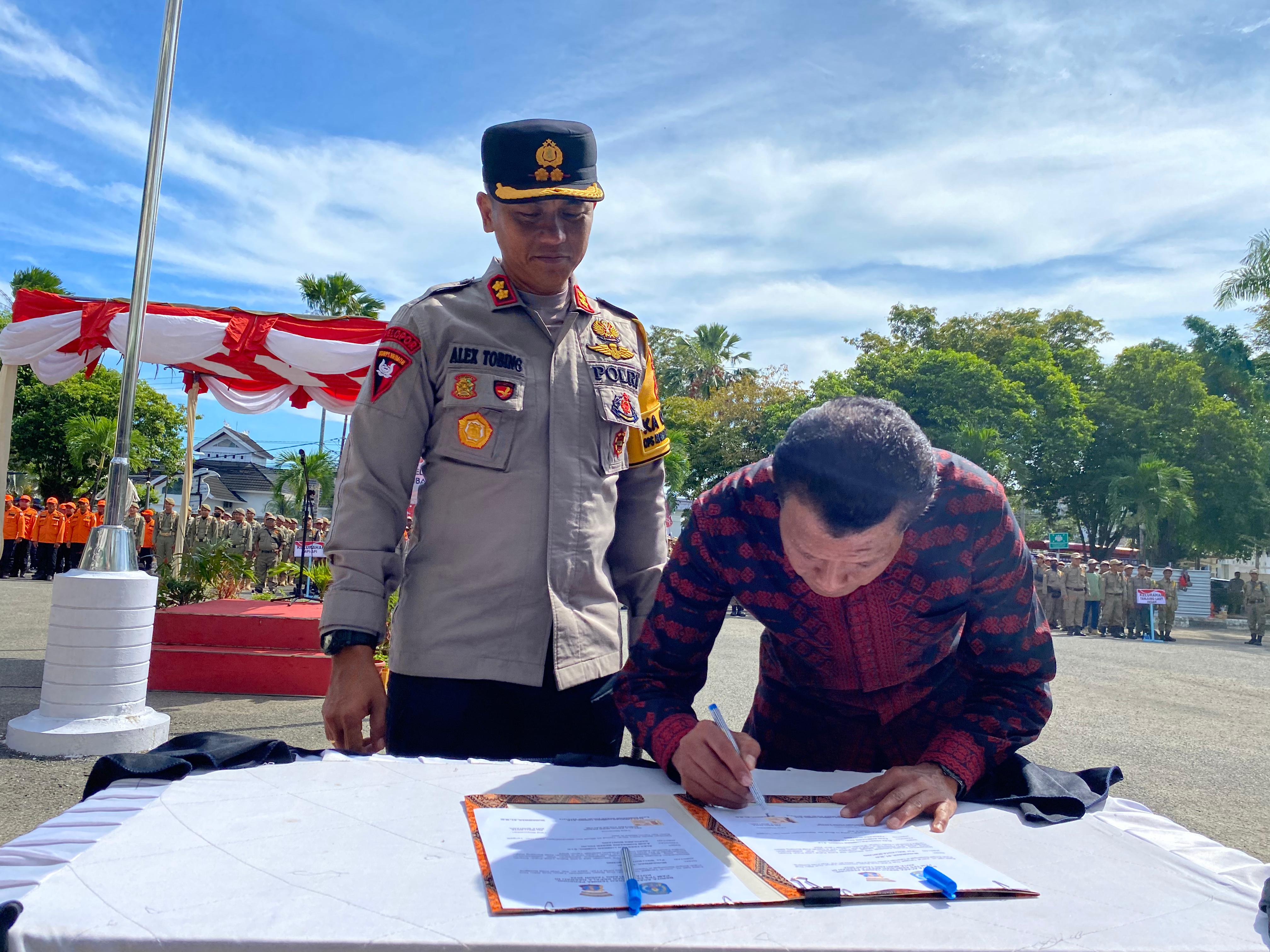 Munawwar Pimpin Apel PAM TPS: Pastikan Keamanan dan Kondusifitas Pilkada Bontang